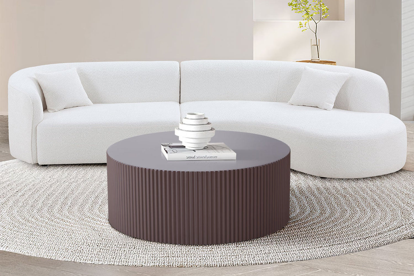 Sleek and Modern Round Coffee Table with Eye-Catching Relief Design
