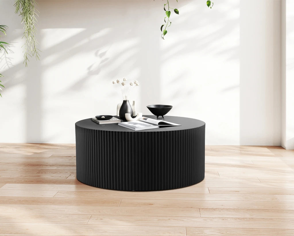 Sleek and Modern Round Coffee Table with Eye-Catching Relief Design