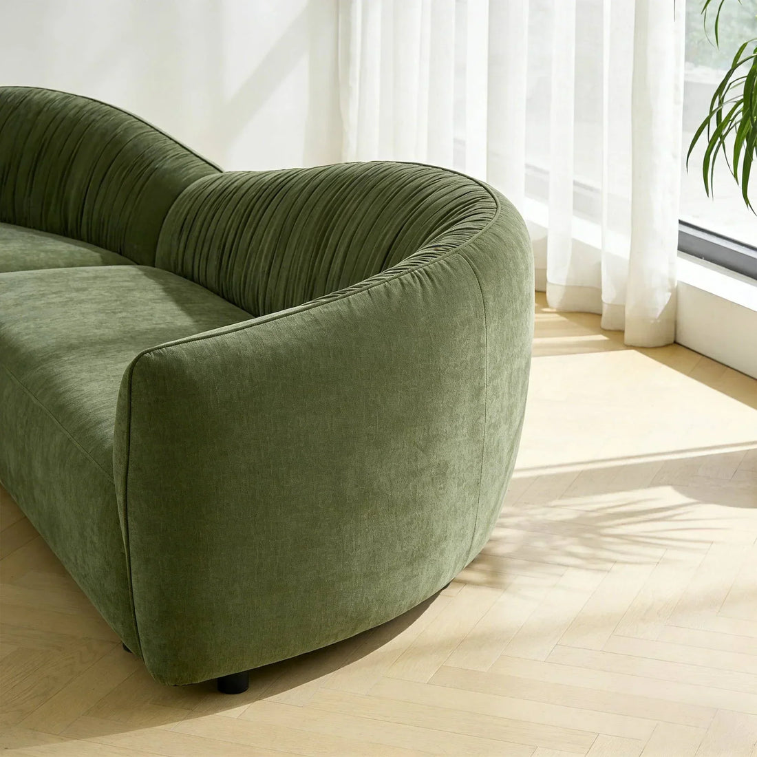 How to Elevate Your Space's Ambiance with the Mountain Curved Sofa?