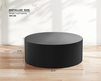 Sleek and Modern Round Coffee Table with Eye-Catching Relief Design