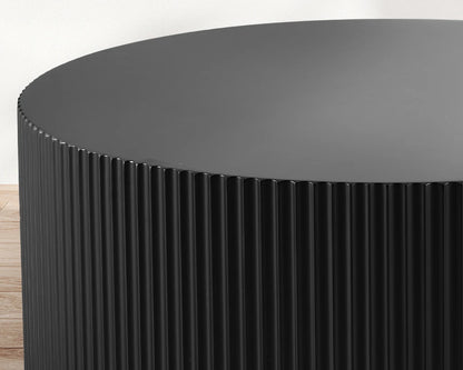 Sleek and Modern Round Coffee Table with Eye-Catching Relief Design