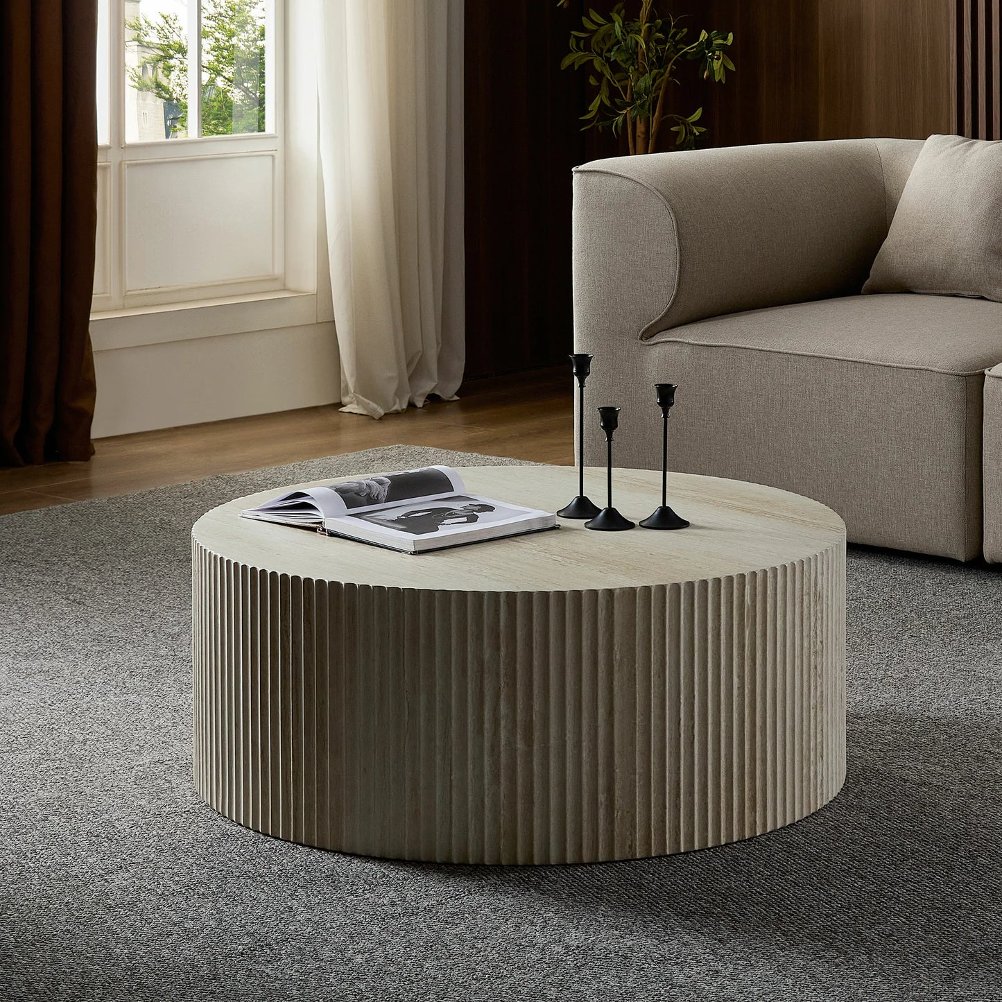 Faux Travertine Round Coffee Table with Eye-Catching Relief Design
