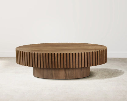 Wooden coffee table with a ribbed design on a plain background