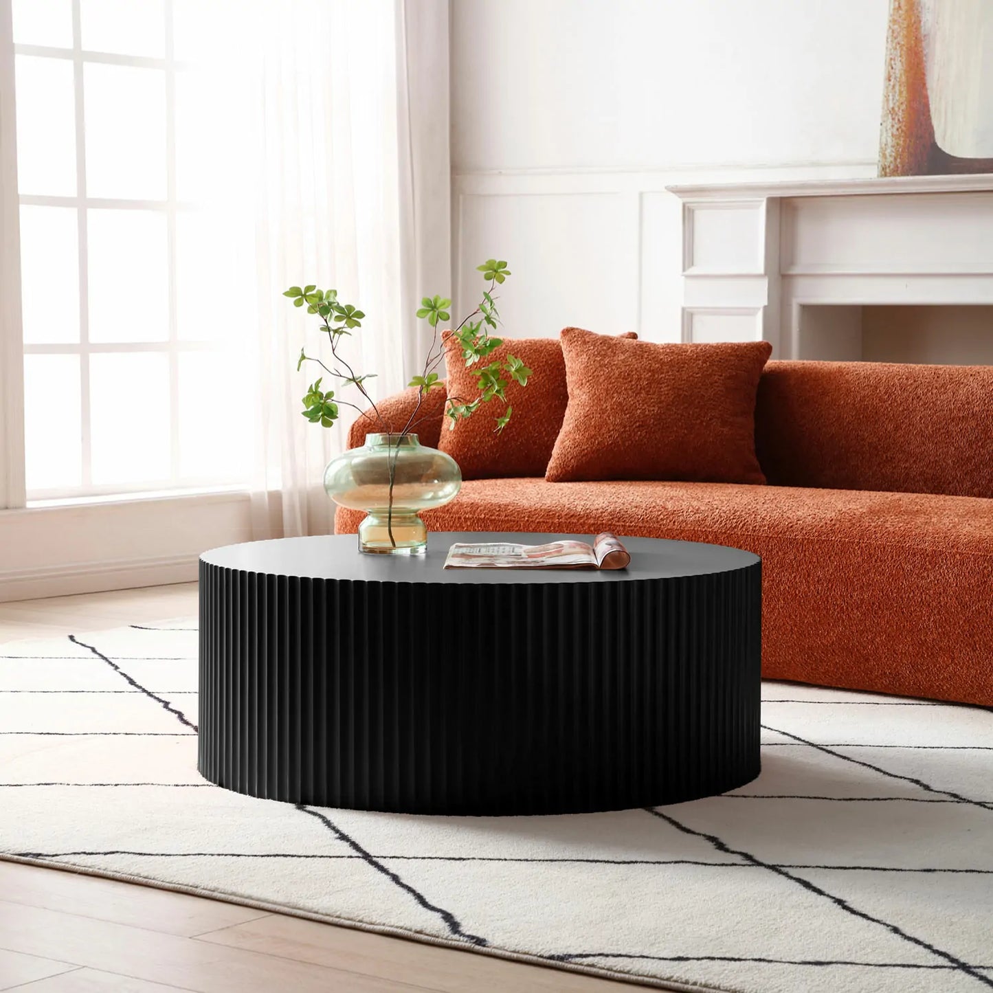 Sleek and Modern Round Coffee Table with Eye-Catching Relief Design