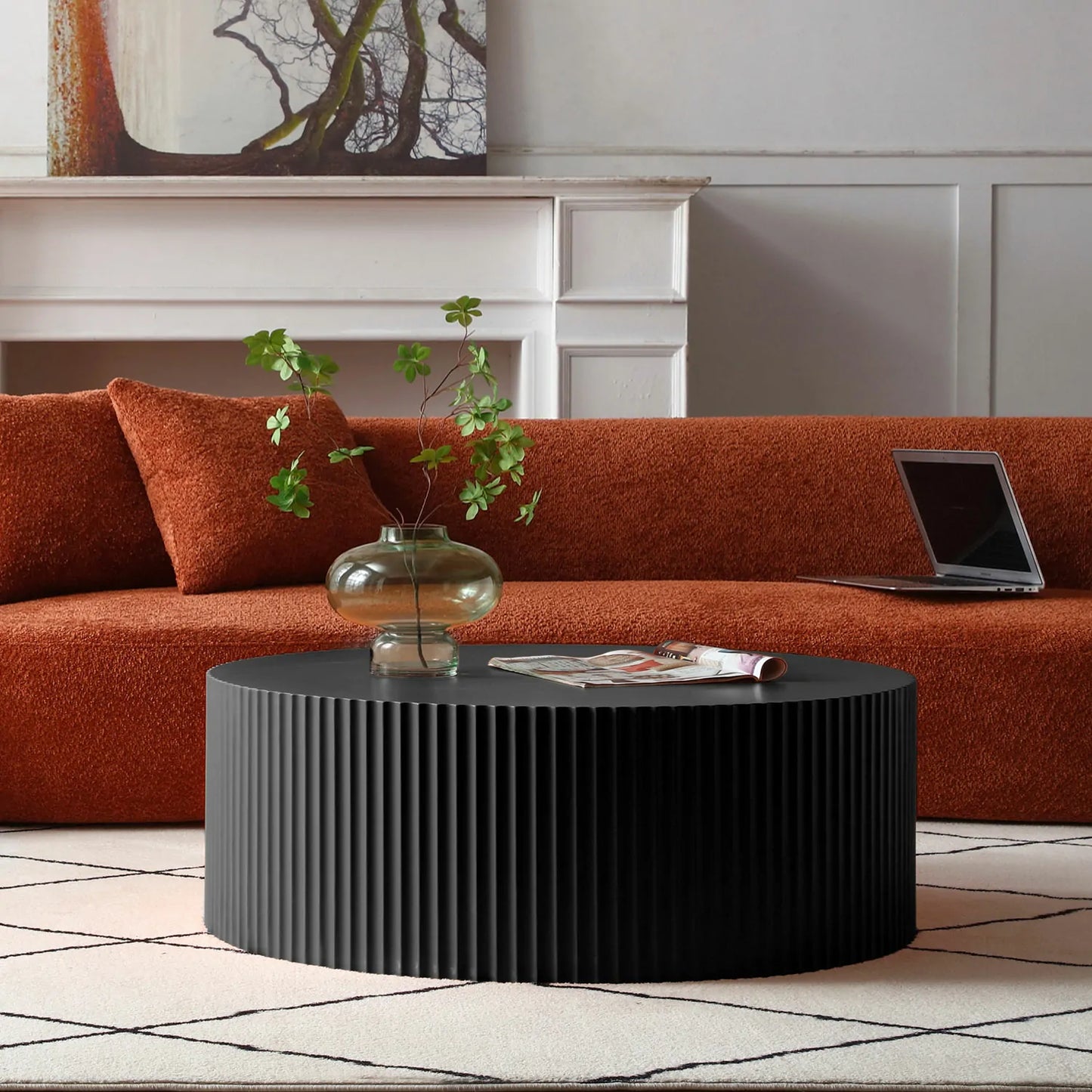 Sleek and Modern Round Coffee Table with Eye-Catching Relief Design