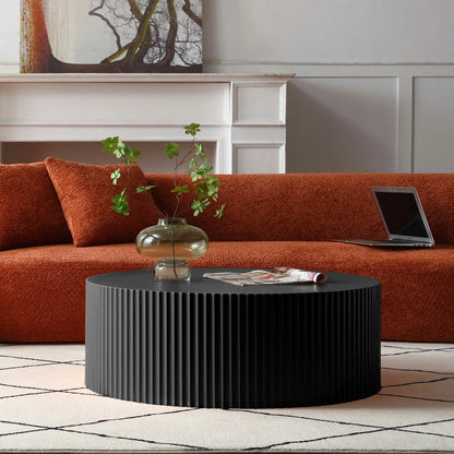Sleek and Modern Round Coffee Table with Eye-Catching Relief Design
