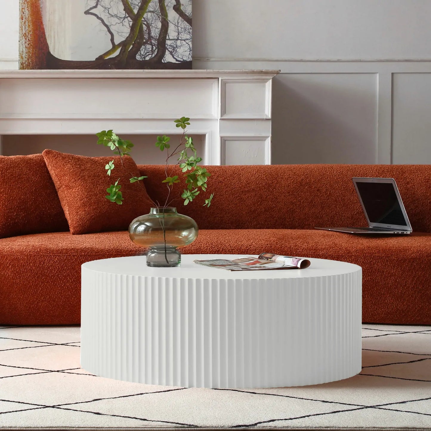 Sleek and Modern Round Coffee Table with Eye-Catching Relief Design