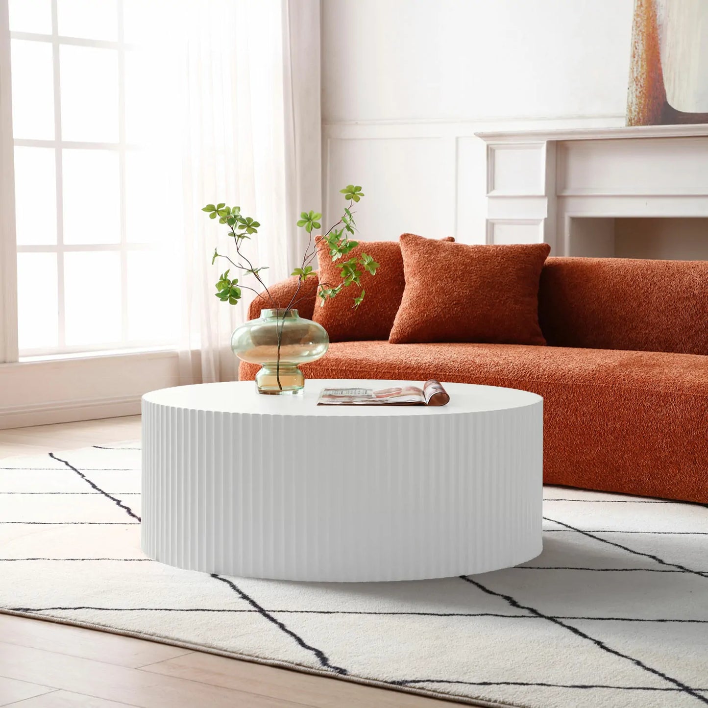 Sleek and Modern Round Coffee Table with Eye-Catching Relief Design